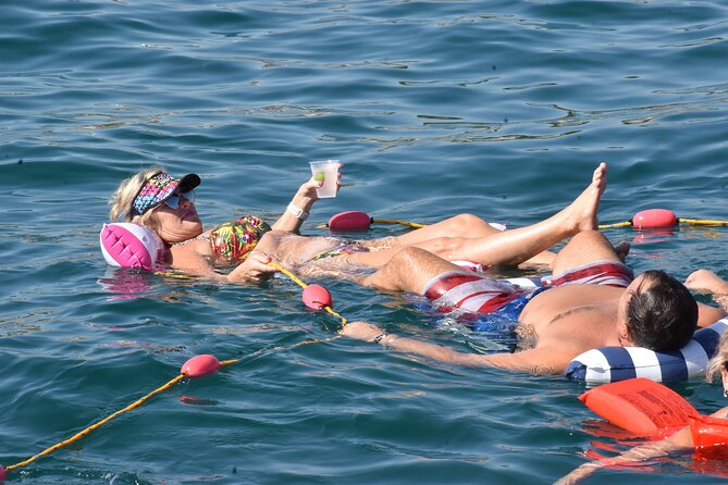 All Inclusive Cabo Boat Tour: Snorkeling, Food, and Drinks - Food, cocktails, and the social mood