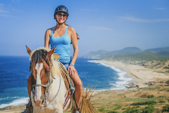 Beach ATV Adventure, Free Horseback Ride, and Sky Bike Experience - Riding a quarter horse along Playa Migriño