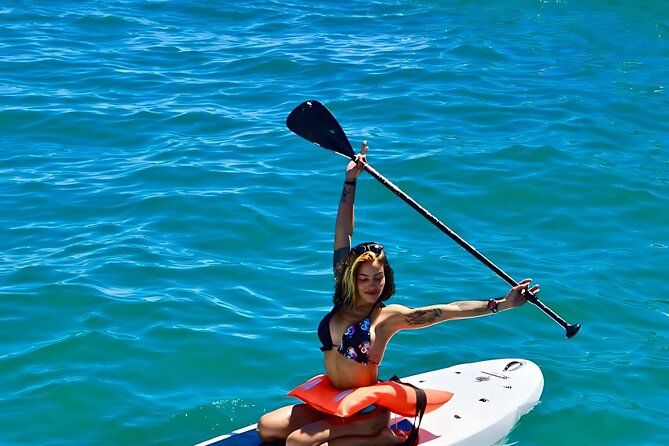 Cabo Catamaran – Snorkeling Tour & Coastal Views - Drinks, music, and the social mood on board