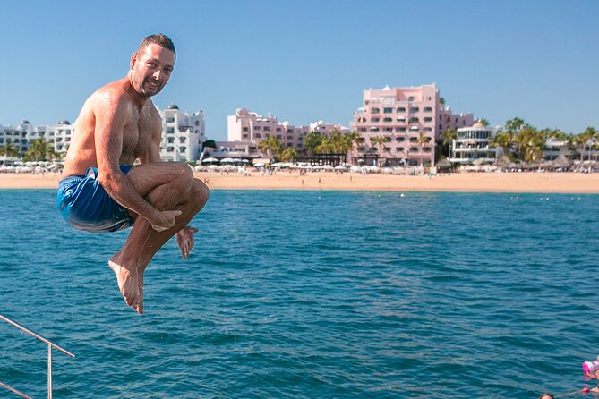 Cabo San Lucas Boat Tour with Snorkeling, Open Bar, and Lunch - Seeing Divorce Beach, Lovers Beach, and the Arch