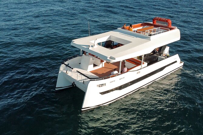 Catamaran - Luxury Private Tour - Passing Divorce Beach and Cabo’s rock formations