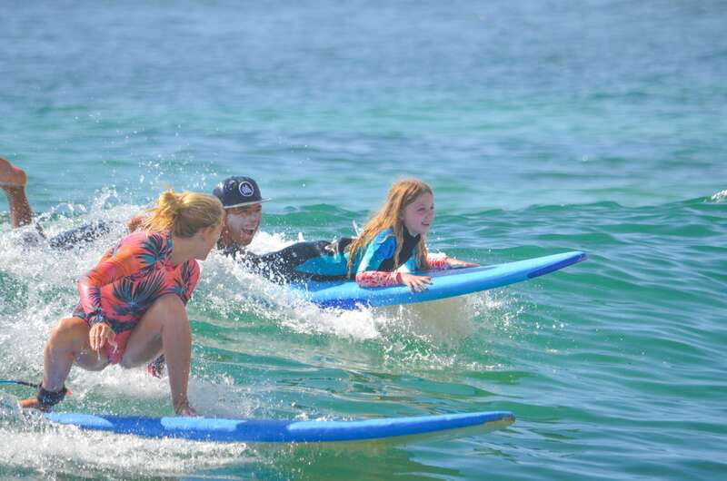 Half Day Surf Lesson in Costa Azul - Getting fitted before the water