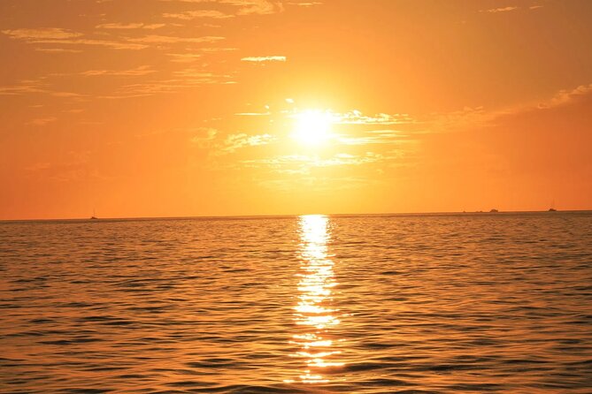 Los Cabos Catamaran Cruise with Open Bar & Light Snack - Music, Space, and the Onboard Mood