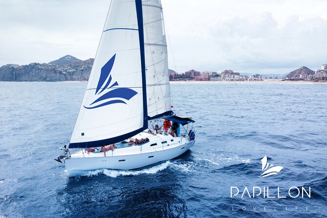 Private Sailboat tour in Cabo San Lucas with Papillon Yachts - Médano Beach, snacks, and time off the clock
