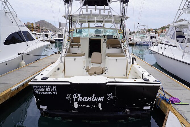 Ultimate Cabo Fishing Experience Aboard the Phantom - The crew turns a bite into a catch